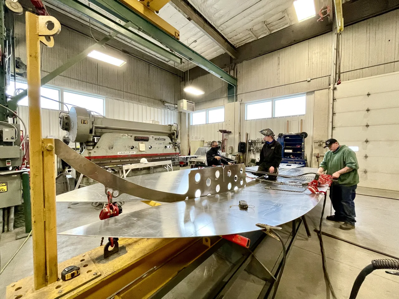 Fabrication work around an unfinished hull panel