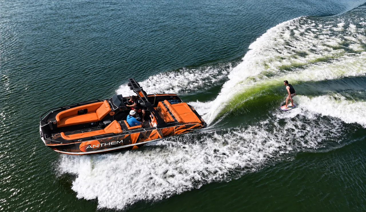 Orange Assault XR23 beside a wakesurfer