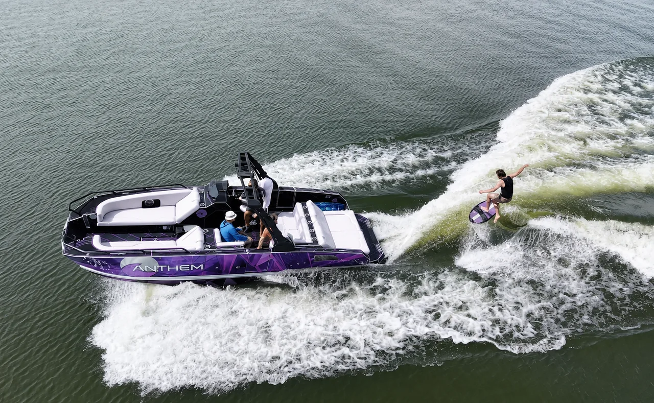 Purple Assault XR23 beside a wakesurfer