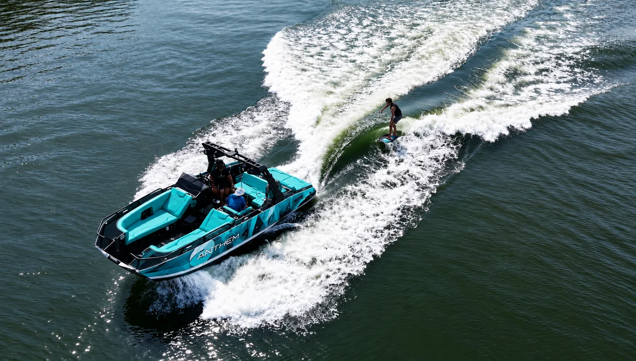 Turquoise Assault XR23 beside a wakesurfer