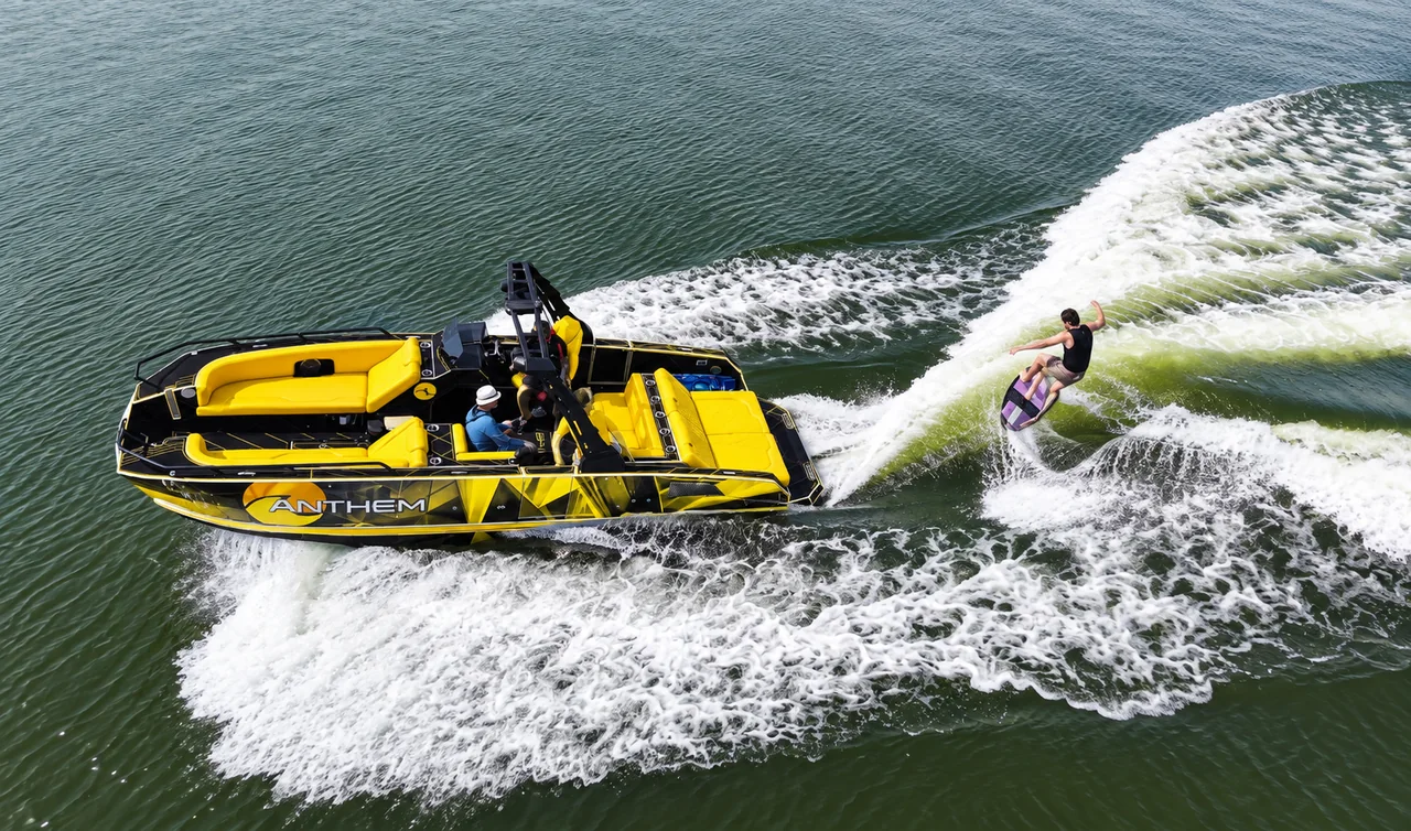 Yellow Assault XR23 beside a wakesurfer